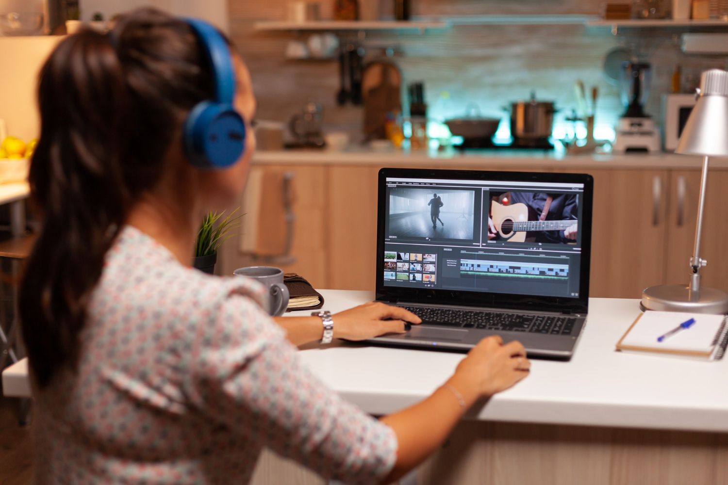 young sound engineer working video footage during post production content creator home working montage film using modern software editing late night